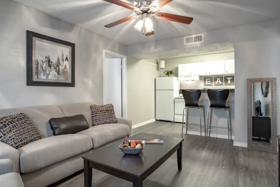 Living Room With Ceiling Fan at Willowick Apartments, College Station, TX