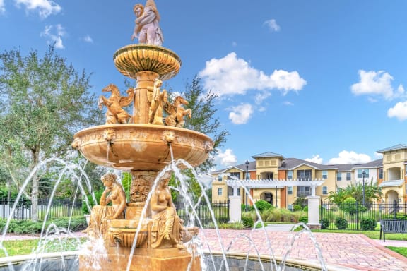 the preserve at ballantyne commons courtyard with benches and a pond