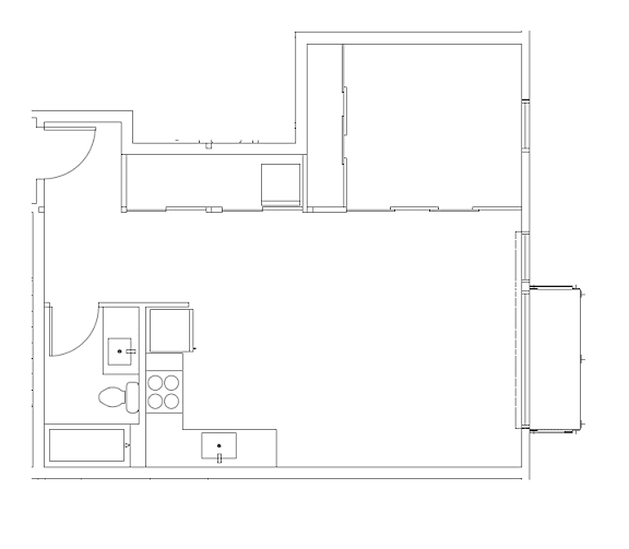 A floor plan of a house with a kitchen, living room, and two bedrooms.