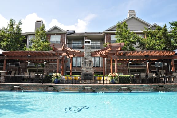 a view of a resort with a swimming pool