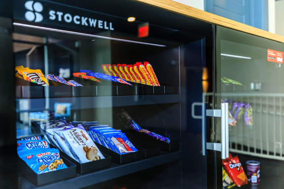 a vending machine filled with candy bars