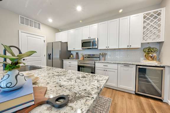 White Cabinetry In Kitchen at Fairmont Apartments, Ohio