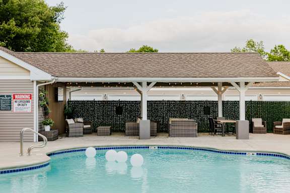 A pool with a sign that says "MILDEN" on it.