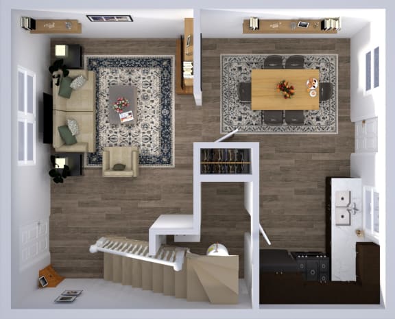 the view of the living room from the top of the stairs