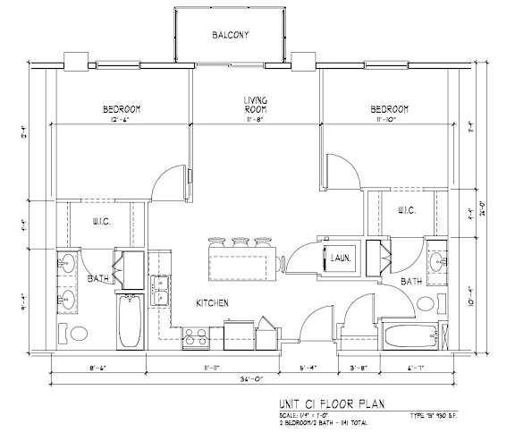 A floor plan of a unit with a living room, two bedrooms, a kitchen, a bathroom, and a laundry area.