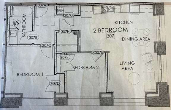 a floor plan of a house with a living area and a dining area