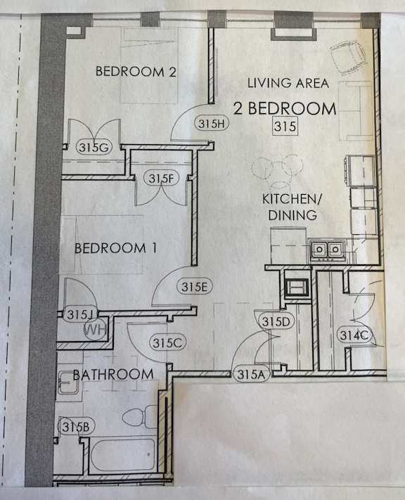 a floor plan of a house with a kitchen and living area