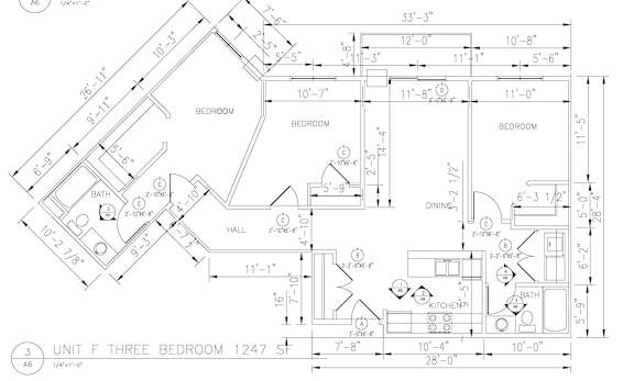 A drawing of a floor plan for a three bedroom apartment.
