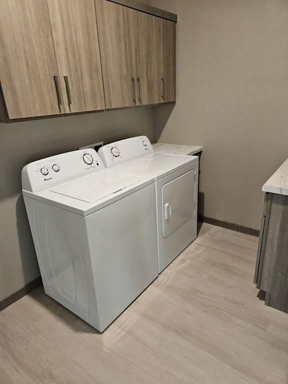 A white washing machine in a laundry room.