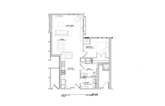 A black and white floor plan of a house with various rooms and measurements.