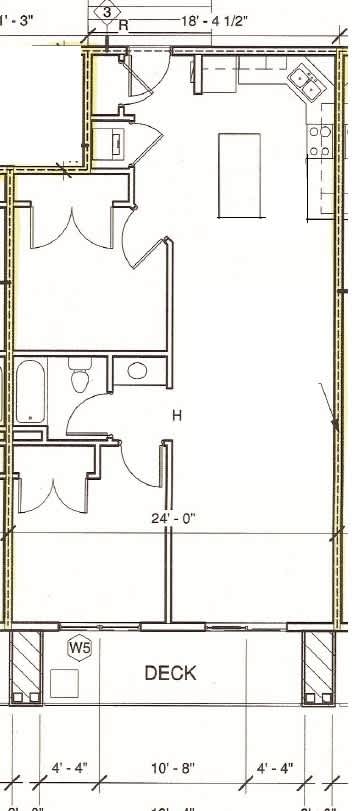 A floor plan of a house with a deck and a kitchen area.