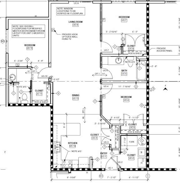 A floor plan for a home with a living room, kitchen, and two bedrooms.