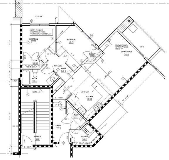 A floor plan of a house with labeled rooms and measurements.