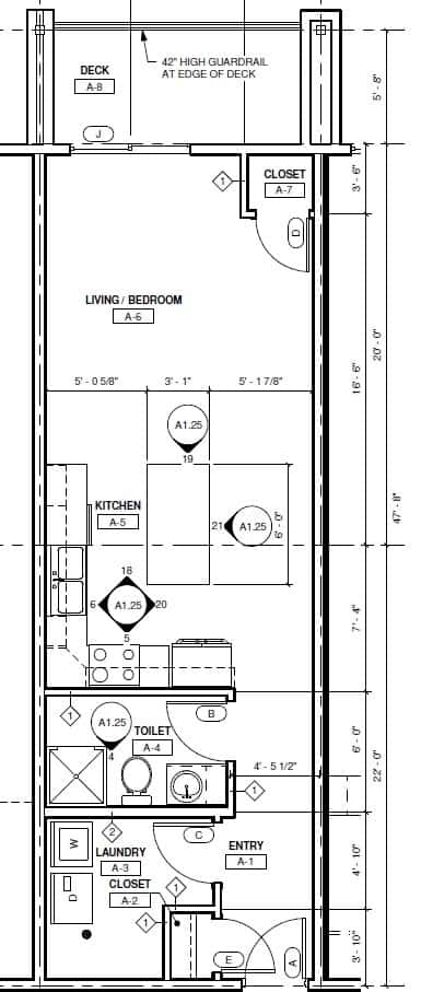 A floor plan of a house with a living room, kitchen, and bathrooms.