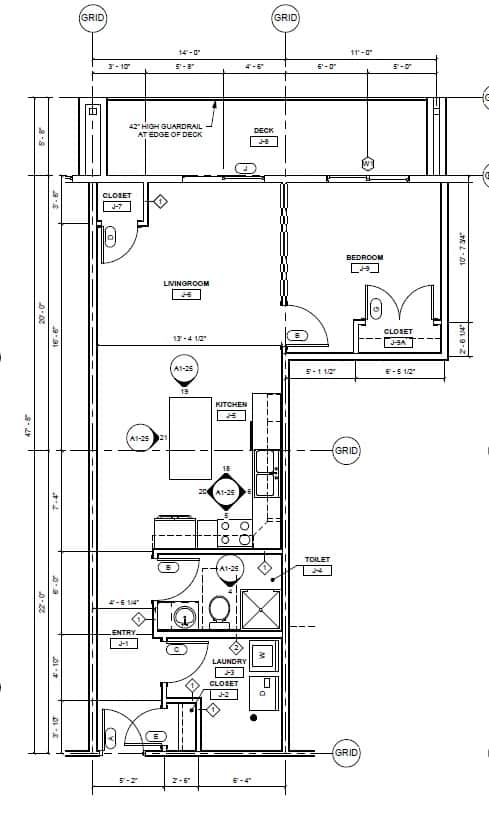 A drawing of a floor plan for a house with a living room, kitchen, and bathroom.