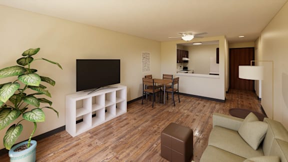 A living room with a brown couch, a white chair, and a television.