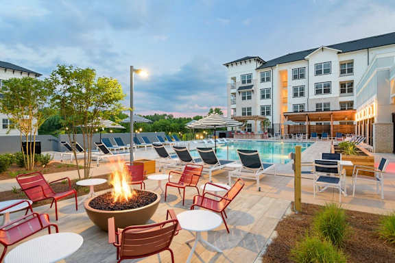 Swimming pool with chairs at The Eddy at Riverview, Georgia
