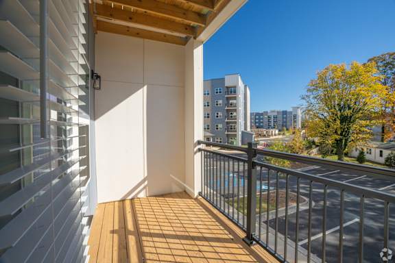 Large Balcony at The Delaney at East Park Apartments, Kennesaw, 30144  Floor Plan  No   26673626  p1947634  The Delaney at East Park  shoootin-photo-16(8).jpg    A gym with a variety of equipment incl