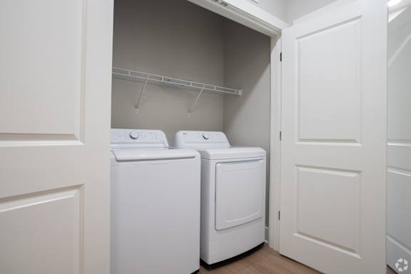 Stacked Washer Dryer at The Delaney at East Park Apartments, Kennesaw, Georgia