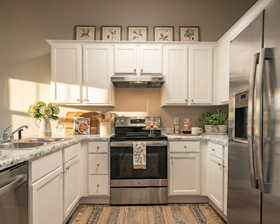 Kitchen with cabinetry at Club Villas Apartments, Kathleen