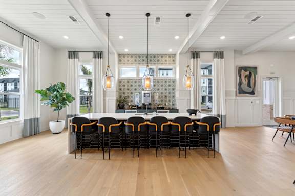 A large conference room with a long table and chairs at The Hendry Apartments, Fort Myers, FL