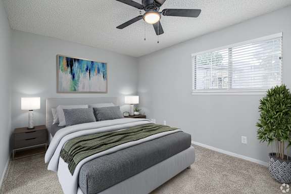 A Bedroom With a Ceiling Fan at Avondale Place Apartments, Georgia, 30002