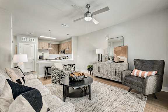 Living Room With Kitchen at The Ashton at East Park Apartments, Kennesaw, GA