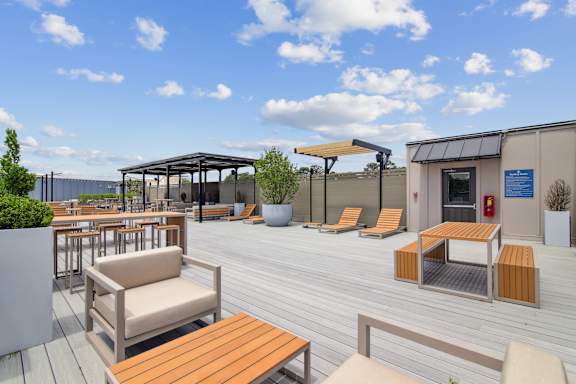 A sunny day at the outdoor seating area of a cafe.