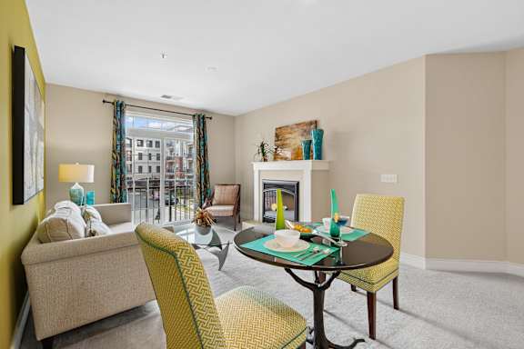 Living Room with Yellow Furniture at Hidden Creek, Gaithersburg, Maryland