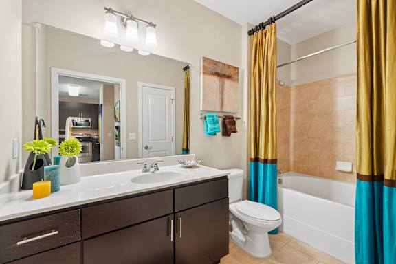 Bathroom with mirror and sink at Hidden Creek, Gaithersburg, MD, 20877