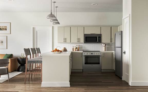 A modern kitchen with a dining table and chairs at The SoHo Luxury Apartments, Raleigh, 27603