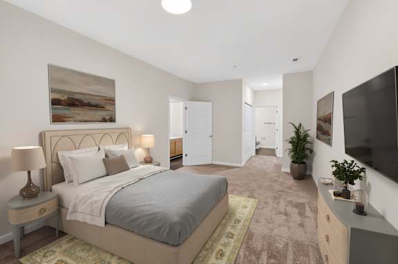 A bedroom with a large bed and a painting on the wall.
