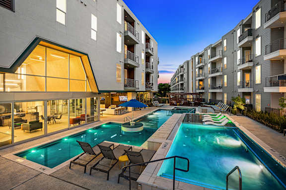 A swimming pool area in a residential building.