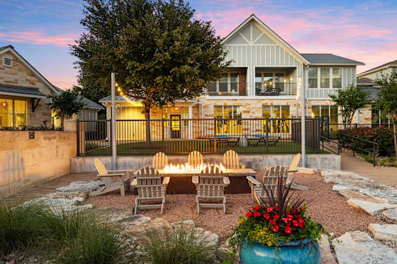 A house with a patio and a fire pit.