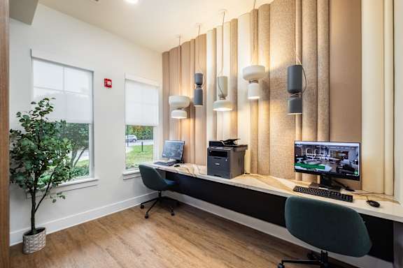 a home office with a desk and a computer