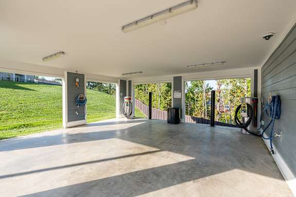 A garage with a concrete floor and a white ceiling.