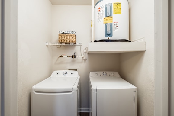 A laundry room with a washer and dryer.