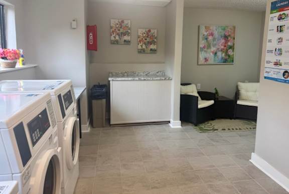 A laundry room with a washer and dryer.