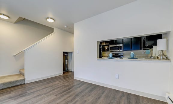 Living Room With Kitchen View at Glen at North Creek, Everett, WA
