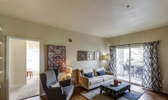 Living Room With Expansive Window at Heritage at Stone Mountain, Colorado
