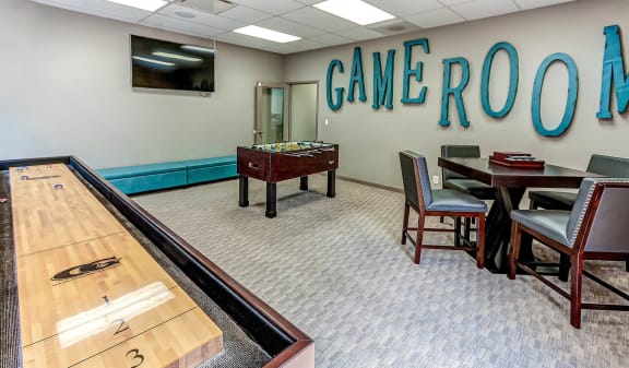 Game Room With Shuffle Board at Union Heights Apartments, Colorado Springs