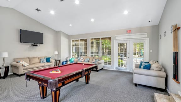 Clubhouse with Billiards and TV at The Willows on Rosemeade, Dallas
