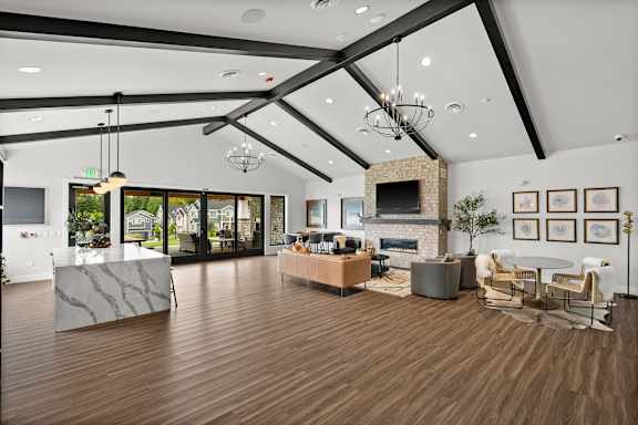 A modern living room with a fireplace and a dining table.