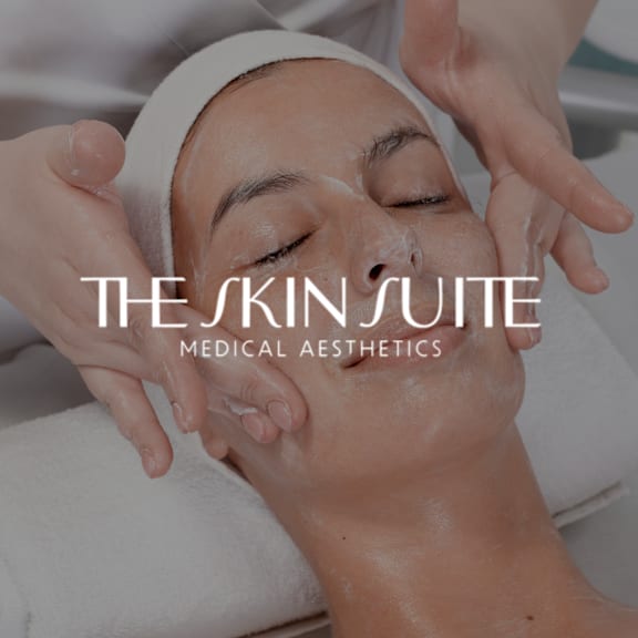 A woman getting her eyebrows done at Revive Lash Co.