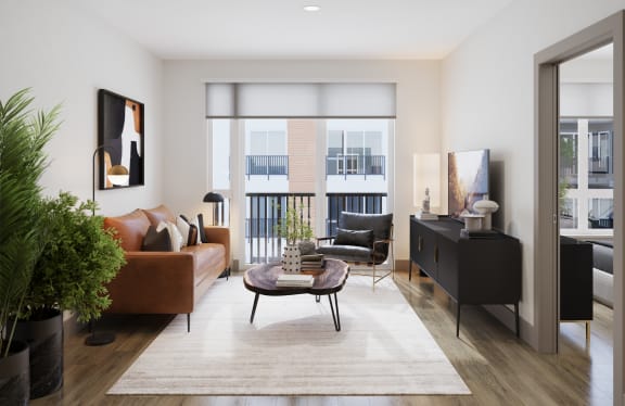a living room with a couch and a table at Bemiston Place Apartments, Missouri, 63105