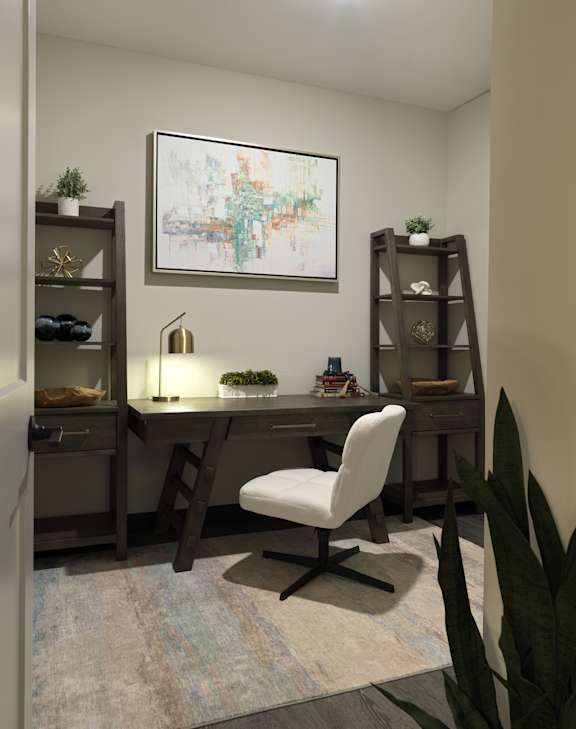 A modern home office with a white chair and a desk with a lamp and a plant on it.