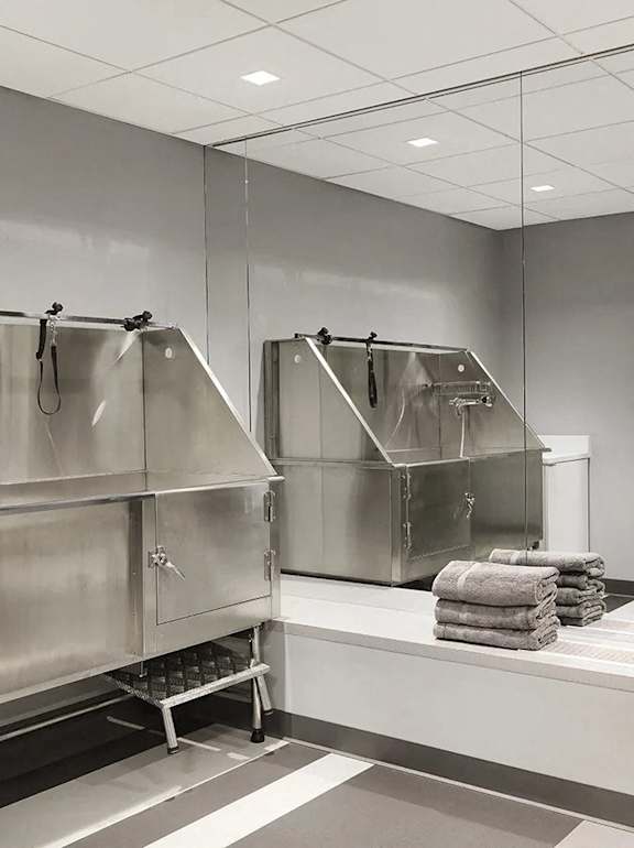 a kitchen with stainless steel refrigerators and folded towels at Clayton On The Park, Missouri