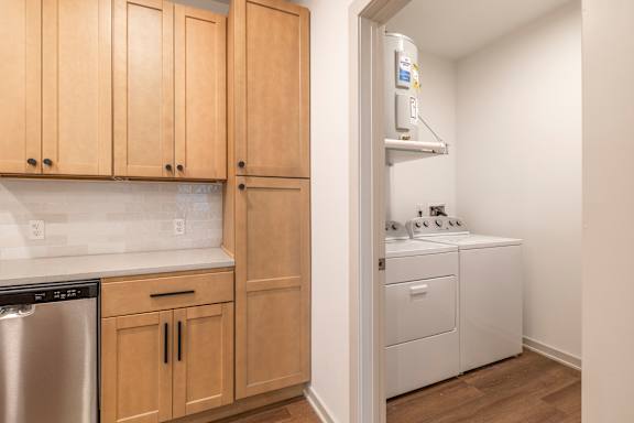 A laundry room with a washer and dryer.