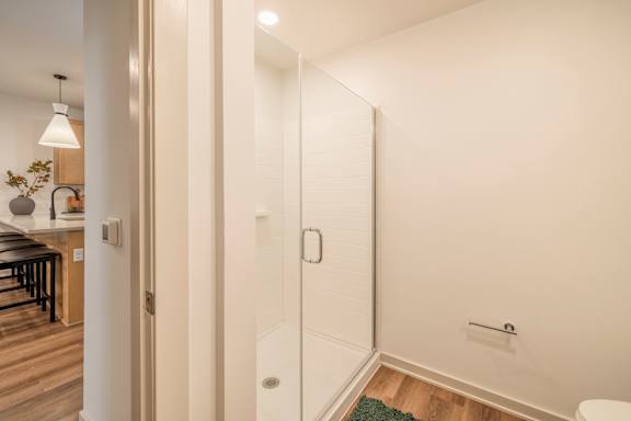 A white bathroom with a toilet and a sink.