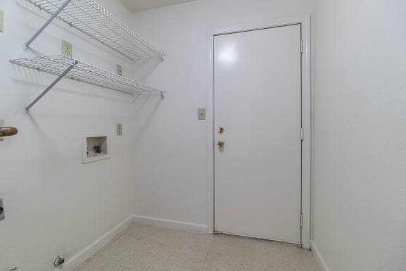 a bedroom with a closet and a door to the bathroom  at Huntington Village **, Georgia